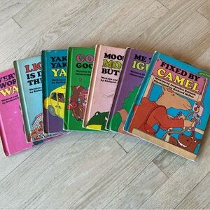 Lot of seven sweet pickles books moose iguana walrus camel yak lion and goose